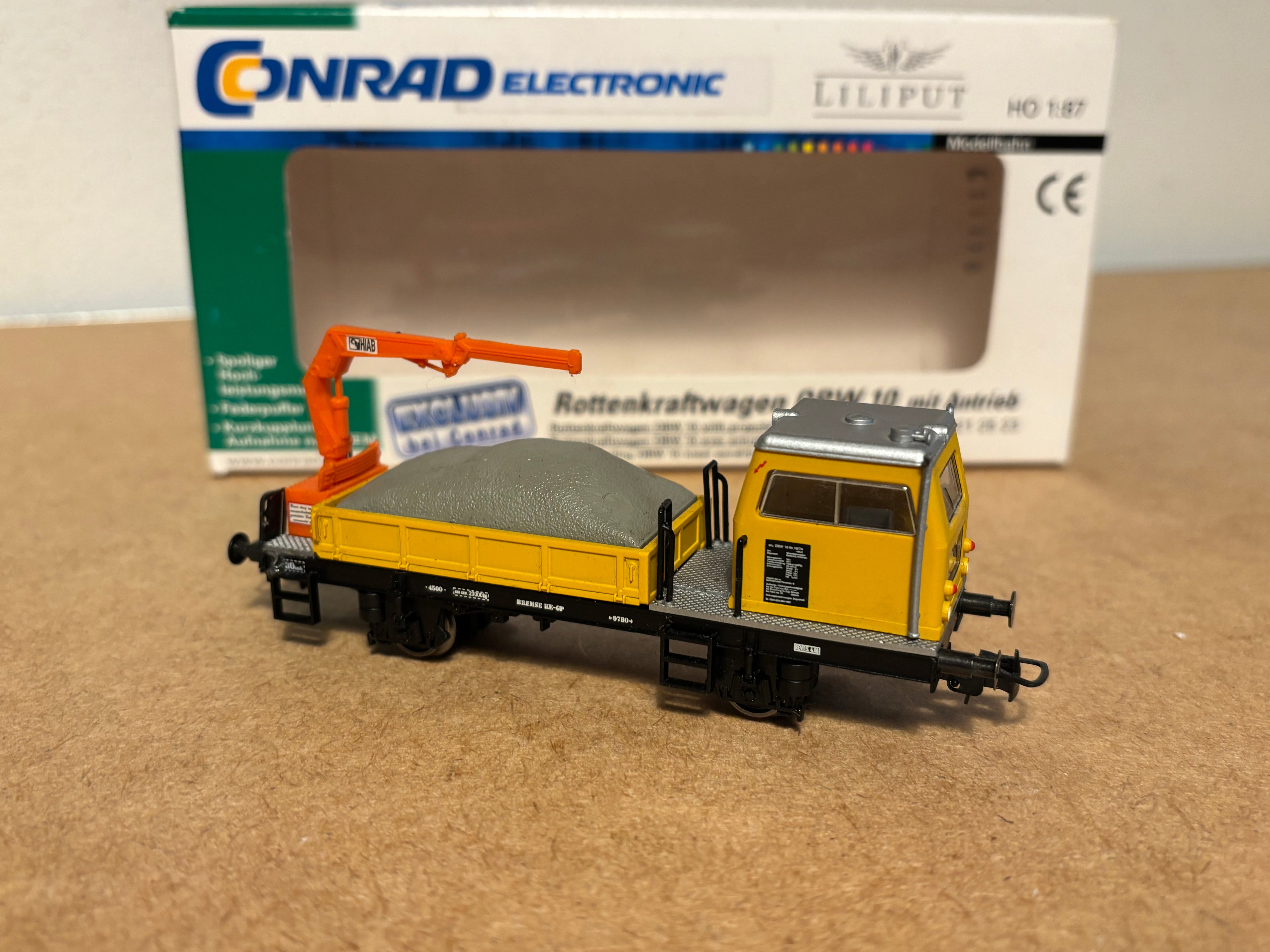 Set wagon plat + grue TRIX HO 23517 dans sa boîte. (Gebraucht) in Set wagon plat + grue TRIX HO 23517 dans sa boîte. (Gebraucht) in