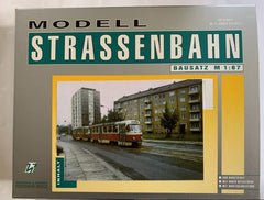 Herrmann und Partner, 23064C/1, Tatra T4D , graue Türen, Bausatz / H0